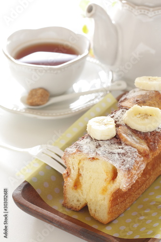 Homemade banana cake on plate with copy space