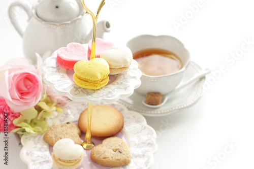 Photos Heart shaped candy and cookie for afternoon tea image