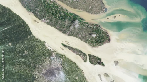 Pollution in Yangtze river after city growth and urbanization in Shanghai area China, time lapse animation aerial satellite view. Contains public domain image by Nasa.  photo