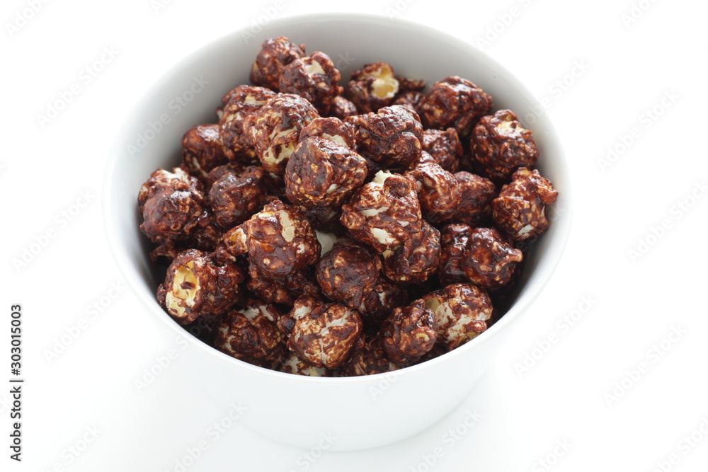 Chocolate popcorn in bowl with copy space Chocolate popcorn in bowl with copy space