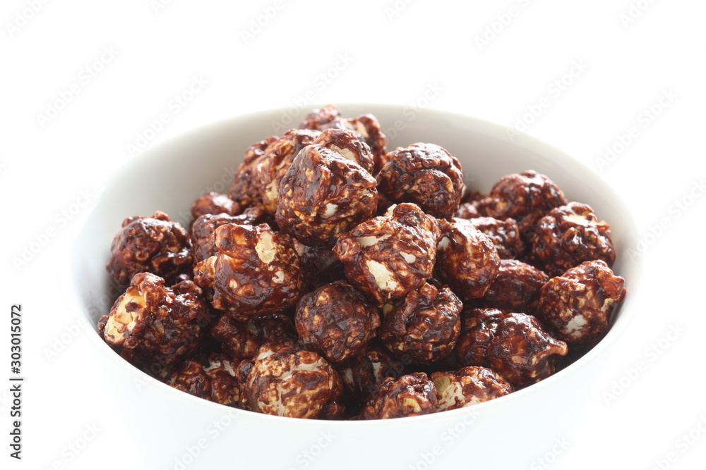 Chocolate popcorn in bowl with copy space Chocolate popcorn in bowl with copy space