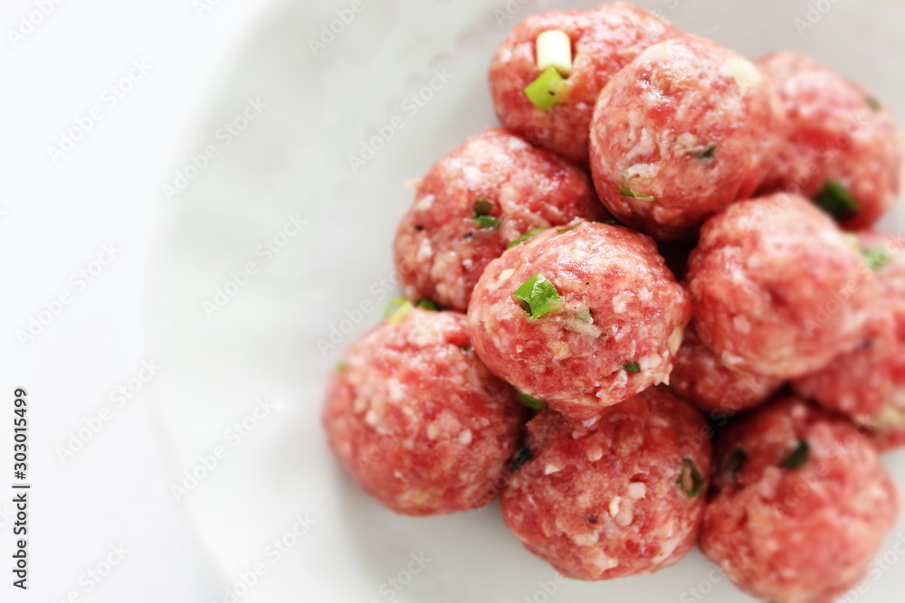 Homemade Chinese pork mea ball on dish for hot pot cooking image Homemade Chinese pork mea ball on dish for hot pot cooking image
