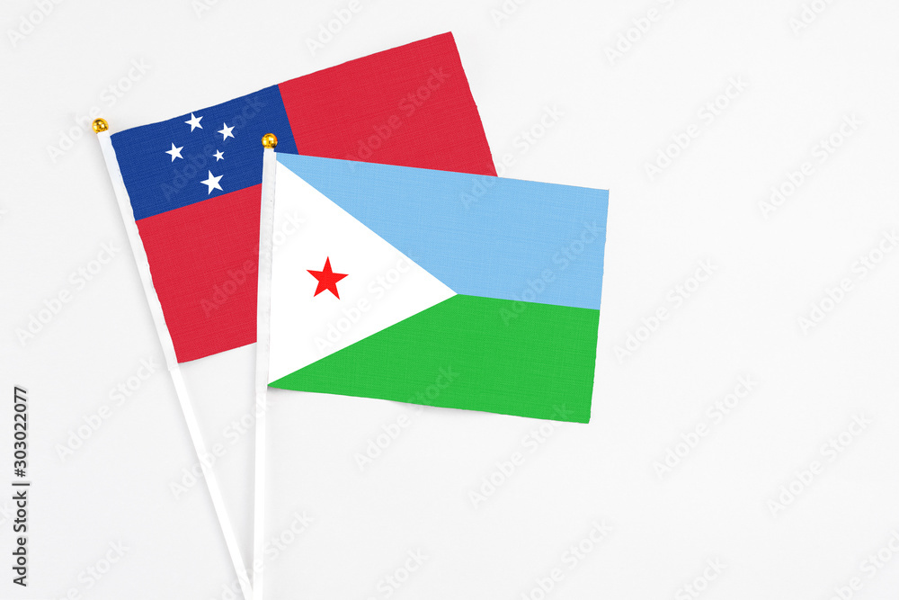 Djibouti and Samoa stick flags on white background. High quality fabric, miniature national flag. Peaceful global concept.White floor for copy space. Djibouti and Samoa stick flags on white background. High quality fabric, miniature national flag. Peaceful global concept.White floor for copy space.