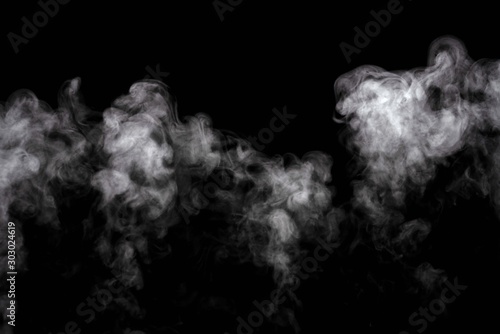 Abstract powder or smoke effect isolated on black background,Out of focus