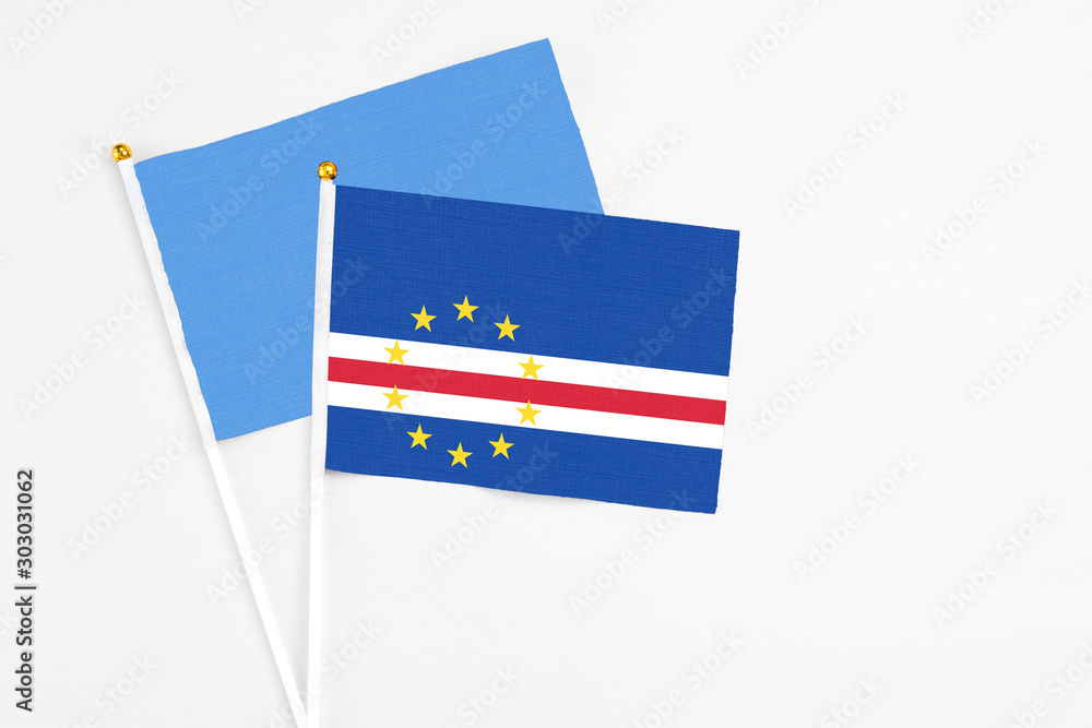 Cape Verde and Somalia stick flags on white background. High quality fabric, miniature national flag. Peaceful global concept.White floor for copy space. Cape Verde and Somalia stick flags on white background. High quality fabric, miniature national flag. Peaceful global concept.White floor for copy space.