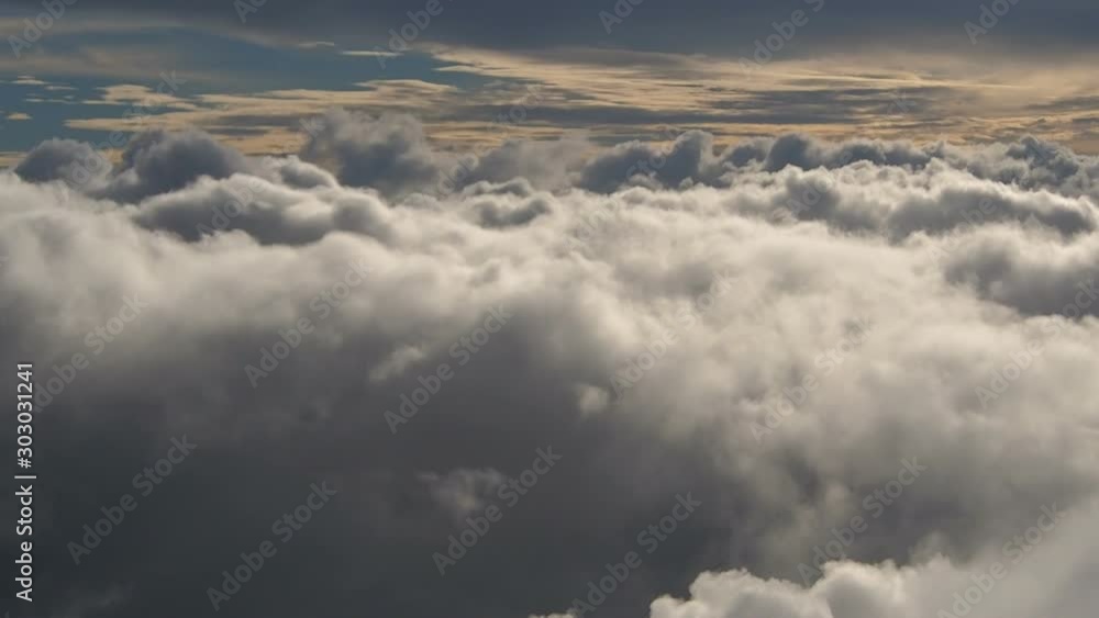 View of cloudscape from the passenger airplane View of cloudscape from the passenger airplane