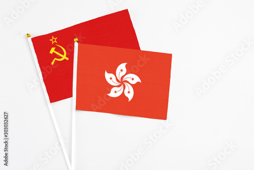 Hong Kong and Soviet Union stick flags on white background. High quality fabric, miniature national flag. Peaceful global concept.White floor for copy space.