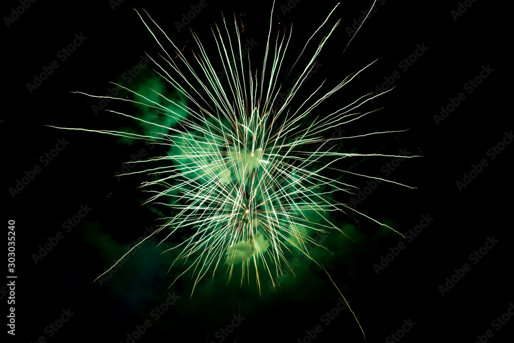 Two Green Sparkling Fireworks Background on Night Scene Two Green Sparkling Fireworks Background on Night Scene