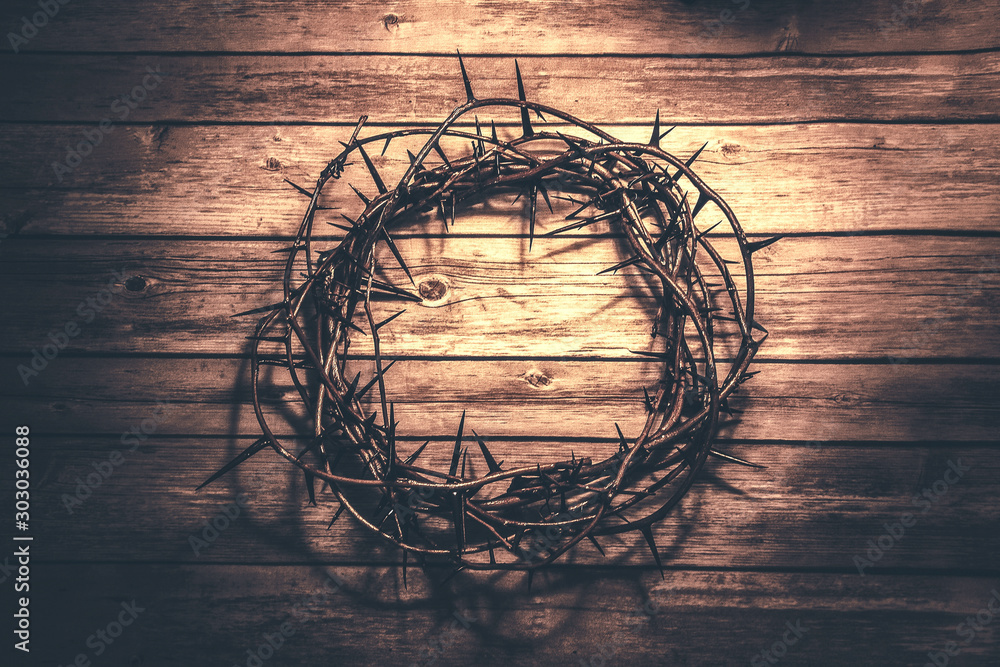 Crown of thorns on wood background Crown of thorns on wood background
