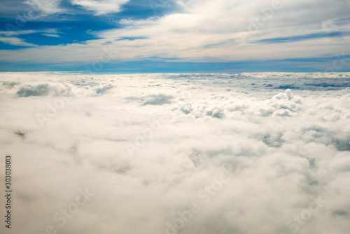 landscape look down from the airplane look see the sky and cloud beautiful beautiful in the morning appropriate the background , idea copy space