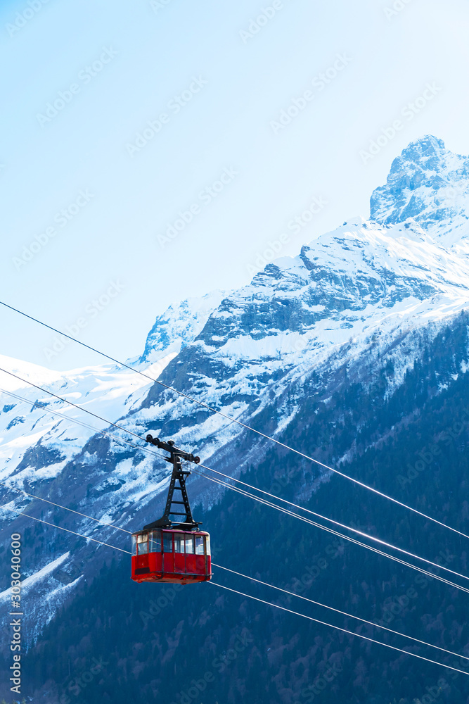 Ski cable car in the winter snow season. blue sky and mountains background. - obrazy, fototapety, plakaty 