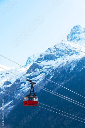 Ski cable car in the winter snow season. blue sky and mountains background.