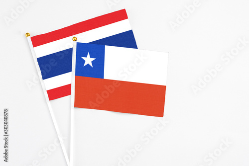 Free Download Chile and Thailand stick flags on white background. High quality fabric, miniature national flag. Peaceful global concept.White floor for copy space. - GFXLoad