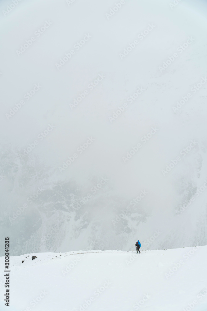 Skier skiing on top of the Caucasus mountain in Russia. Skier skiing on top of the Caucasus mountain in Russia.