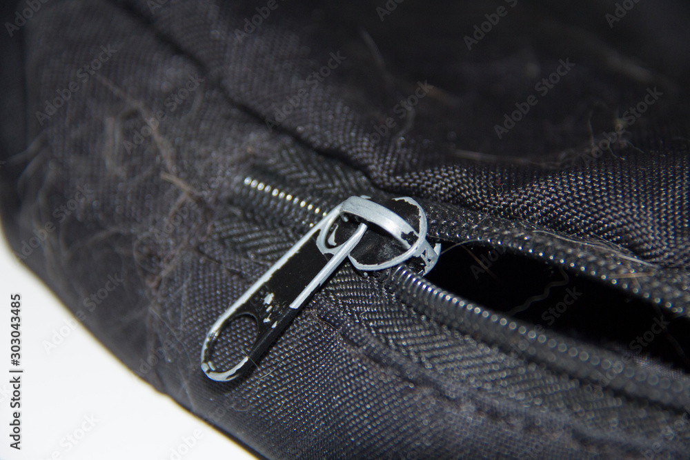 closeup of zipper on jeans closeup of zipper on jeans