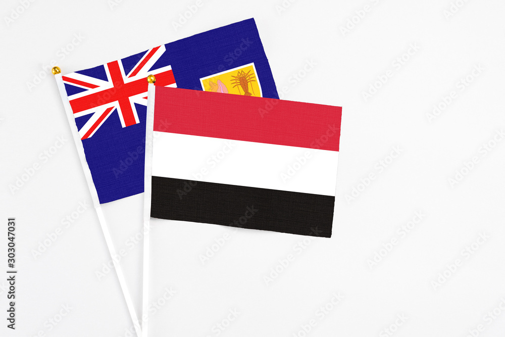 Yemen and Turks And Caicos Islands stick flags on white background. High quality fabric, miniature national flag. Peaceful global concept.White floor for copy space. Yemen and Turks And Caicos Islands stick flags on white background. High quality fabric, miniature national flag. Peaceful global concept.White floor for copy space.