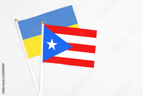 Free Download Puerto Rico and Ukraine stick flags on white background. High quality fabric, miniature national flag. Peaceful global concept.White floor for copy space. - GFXLoad