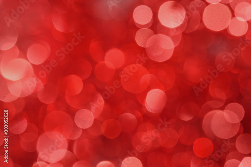 Abstract red color bokeh. Christmas background