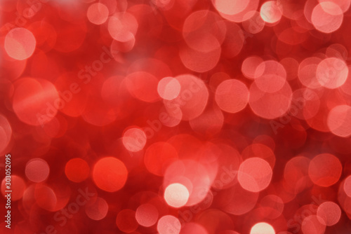 Abstract red color bokeh. Christmas background