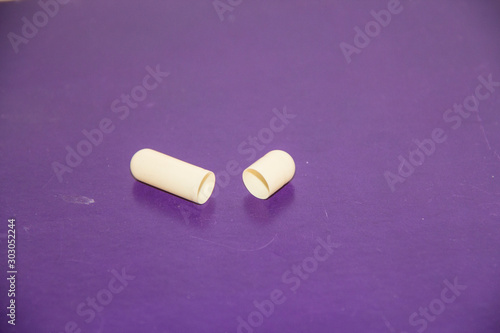 red pills on white background