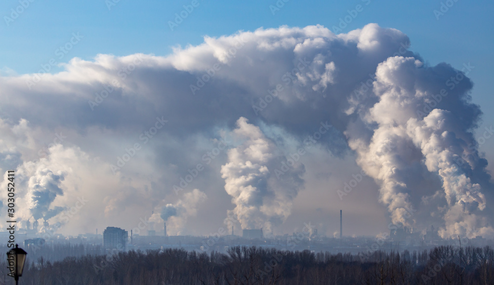 Smoke from the chimneys of a metallurgical plant at dawn Smoke from the chimneys of a metallurgical plant at dawn