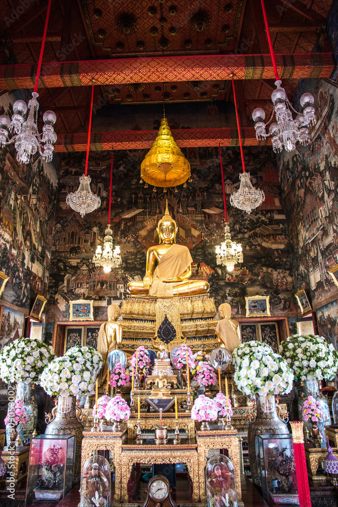 Golden statue of buddha inside the Ordination Hall at the Wat Arun temple, Bangkok, Thailand