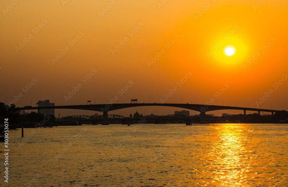 A sunset view of the Rama III Bridge, Bangkok, Thailand