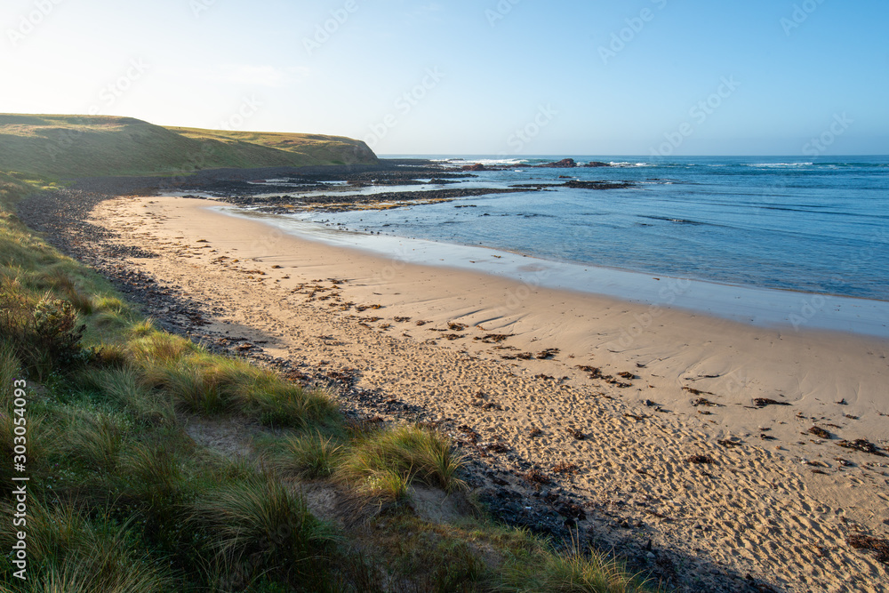 Landscape of Kitty Miller Bay at sunrise. This circular bay situated on the ocean side of Phillip Island is the perfect place for newbies through to experienced snorkelers.