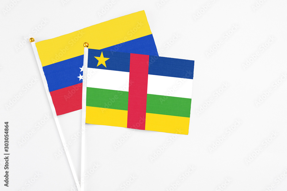 Central African Republic and Venezuela stick flags on white background. High quality fabric, miniature national flag. Peaceful global concept.White floor for copy space. Central African Republic and Venezuela stick flags on white background. High quality fabric, miniature national flag. Peaceful global concept.White floor for copy space.