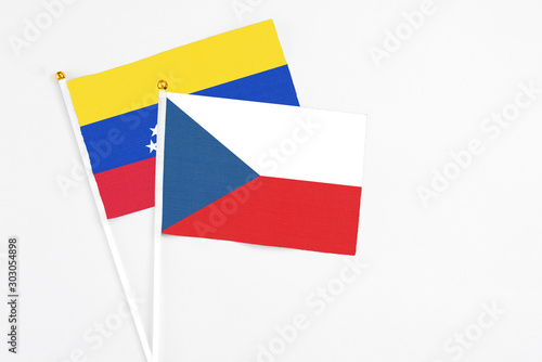 Free Download Czech Republic and Venezuela stick flags on white background. High quality fabric, miniature national flag. Peaceful global concept.White floor for copy space. - GFXLoad