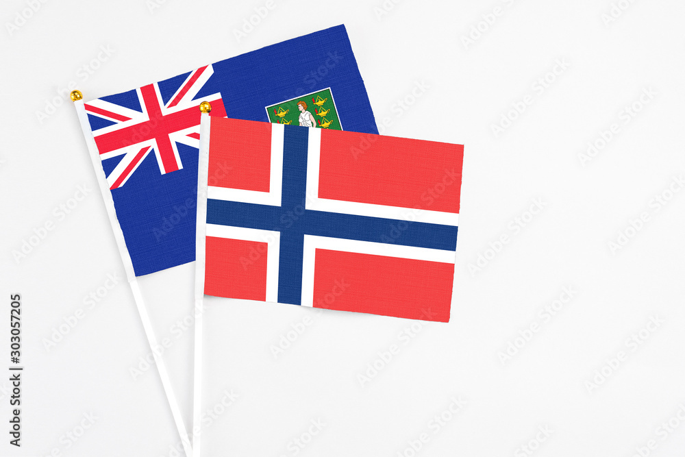 Norway and British Virgin Islands stick flags on white background. High quality fabric, miniature national flag. Peaceful global concept.White floor for copy space. Norway and British Virgin Islands stick flags on white background. High quality fabric, miniature national flag. Peaceful global concept.White floor for copy space.