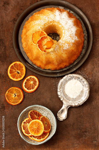 Bundt orange cake with icing sugar