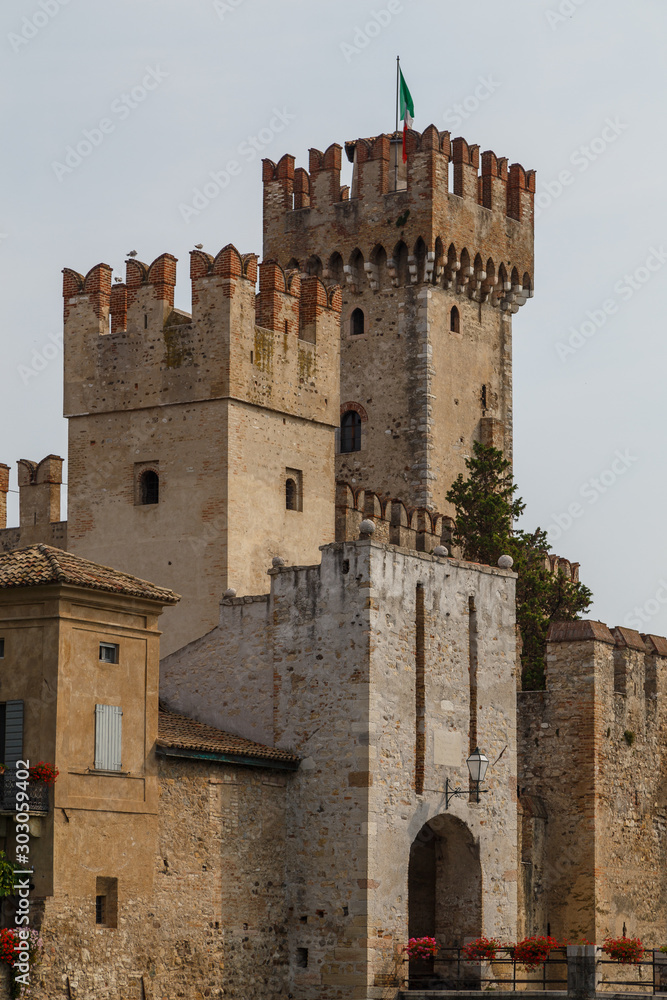 View to the medieval Rocca Scaligera castle in Sirmione town on Garda lake, Italy