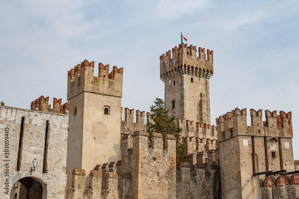 View to the medieval Rocca Scaligera castle in Sirmione town on Garda lake, Italy