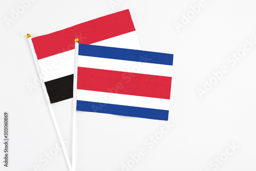 Free Download Costa Rica and Yemen stick flags on white background. High quality fabric, miniature national flag. Peaceful global concept.White floor for copy space. - GFXLoad