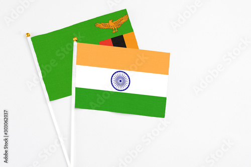 Free Download India and Zambia stick flags on white background. High quality fabric, miniature national flag. Peaceful global concept.White floor for copy space. - GFXLoad
