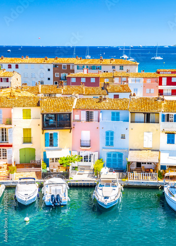 Fotografie, Obraz View Of Colorful Houses And Boats In Port Grimaud During Summer Day-Port Grimaud