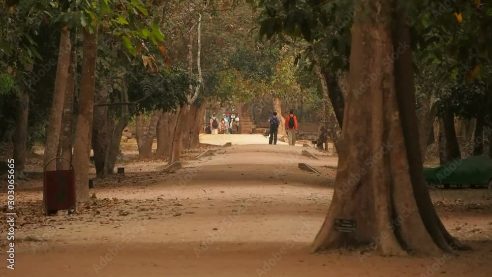 Empty walkway to the temple through jungle at the evening after closure, Siem Riep, Cambodia Empty walkway to the temple through jungle at the evening after closure, Siem Riep, Cambodia