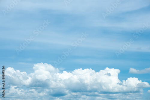 Bright blue sky background with sun light with copy space © Sathaporn