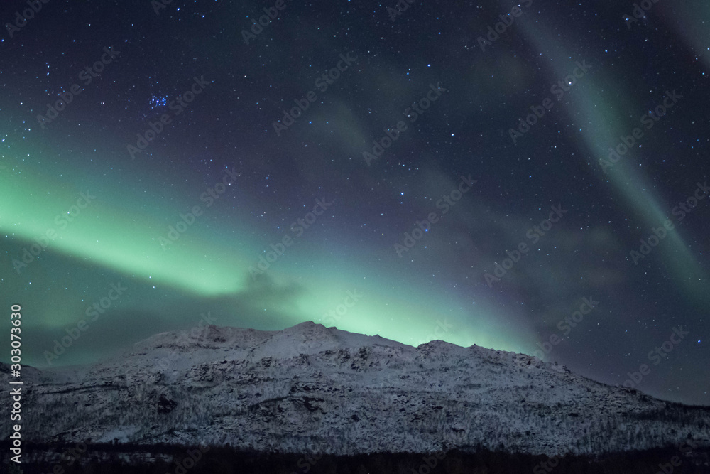 Northern lights or borealis aurora in north Norway