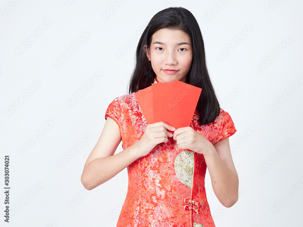 Woman in traditional chinese dress holding red envelope Woman in traditional chinese dress holding red envelope