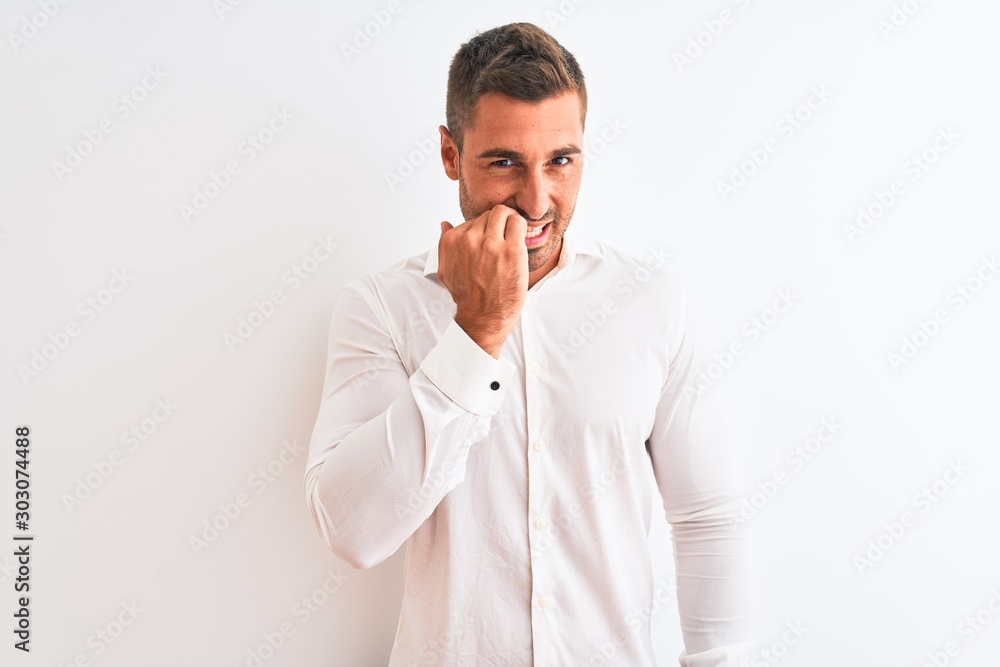 Young handsome business man wearing elegant shirt over isolated background looking stressed and nervous with hands on mouth biting nails. Anxiety problem. Young handsome business man wearing elegant shirt over isolated background looking stressed and nervous with hands on mouth biting nails. Anxiety problem.
