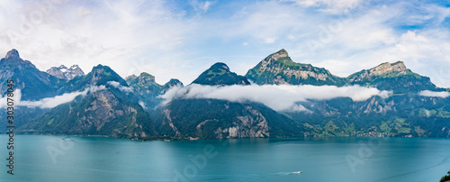 Switzerland, Panoramic view on green Swiss Alps and lake Lucerne near Isleten, Bauen