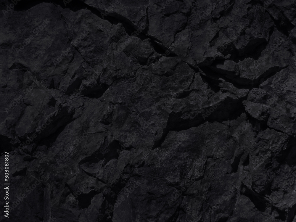 Fototapeta premium Black grunge texture. Dark abstract stone grunge background. Rock background. Mountain close-up. Black abstract stone backdrop.