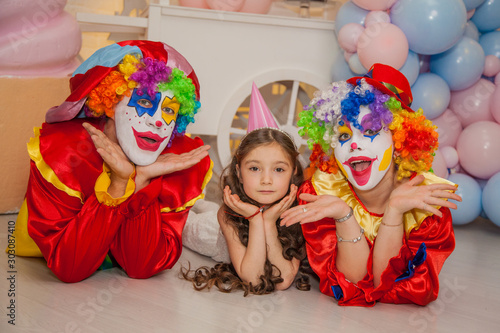 Clowns from the circus on the girls birthday. Party for children. © izida1991