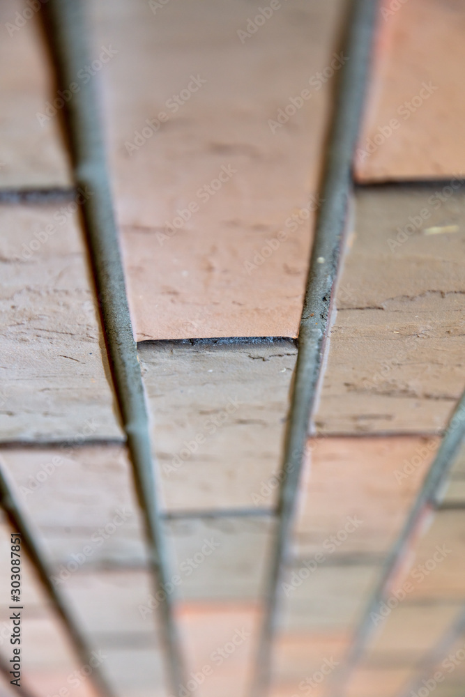 Bricks in the wall of a house as an abstract background