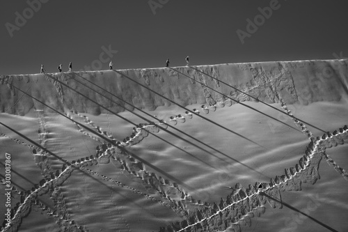 People hiking the sand dunes in Namibia