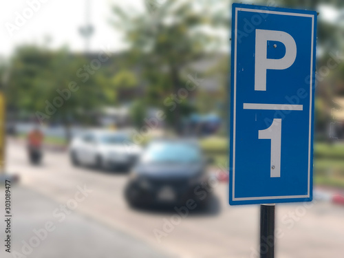 Parking area first row sign and car turn right to park background