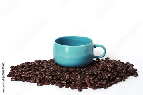 Coffee Cup and fresh coffee beans on white background .
