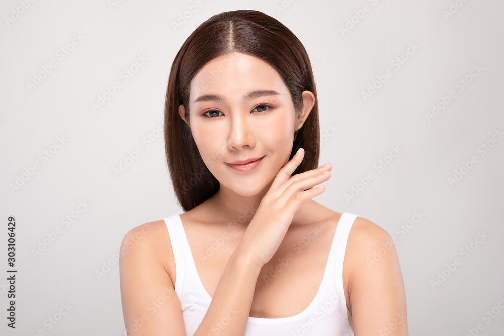 Beautiful Asian young woman touching soft cheek smile with clean and fresh skin Happiness and cheerful with positive emotional,isolated on white background,Beauty and Cosmetics Concept Beautiful Asian young woman touching soft cheek smile with clean and fresh skin Happiness and cheerful with positive emotional,isolated on white background,Beauty and Cosmetics Concept